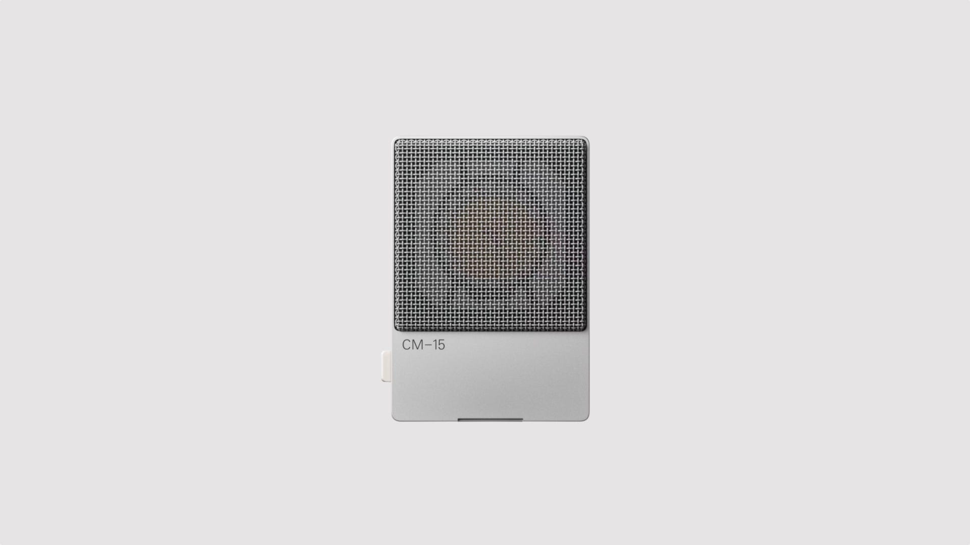 The CM-15 microphone from Teenage Engineering on a gray background.